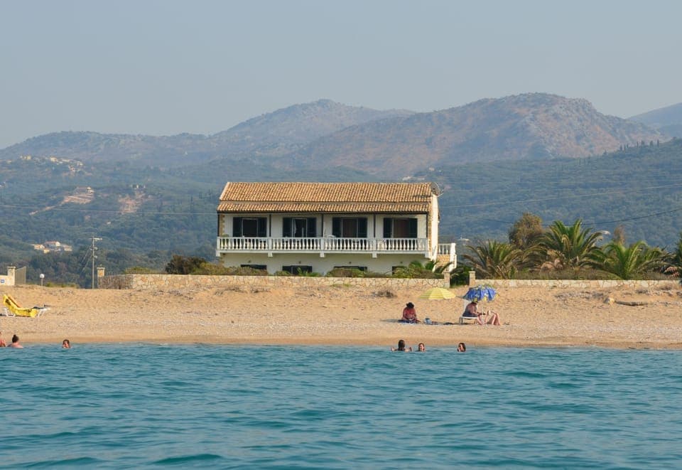 On the beach, sun loungers, beach umbrellas