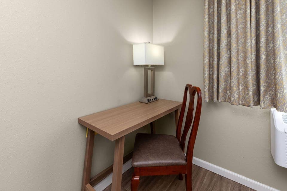 Premium bedding, blackout drapes, iron/ironing board, rollaway beds