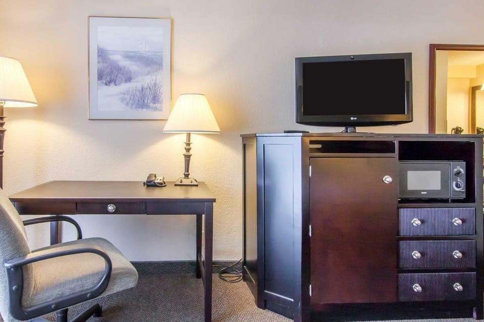 Premium bedding, desk, blackout drapes, iron/ironing board