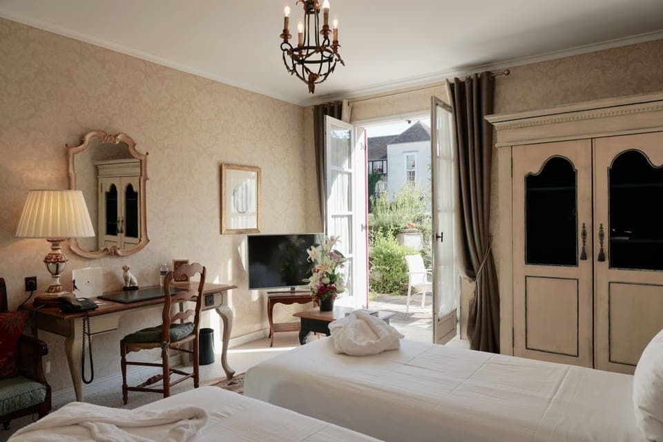 Twin Room, Garden View (terrace) | Desk, laptop workspace, blackout drapes, iron/ironing board