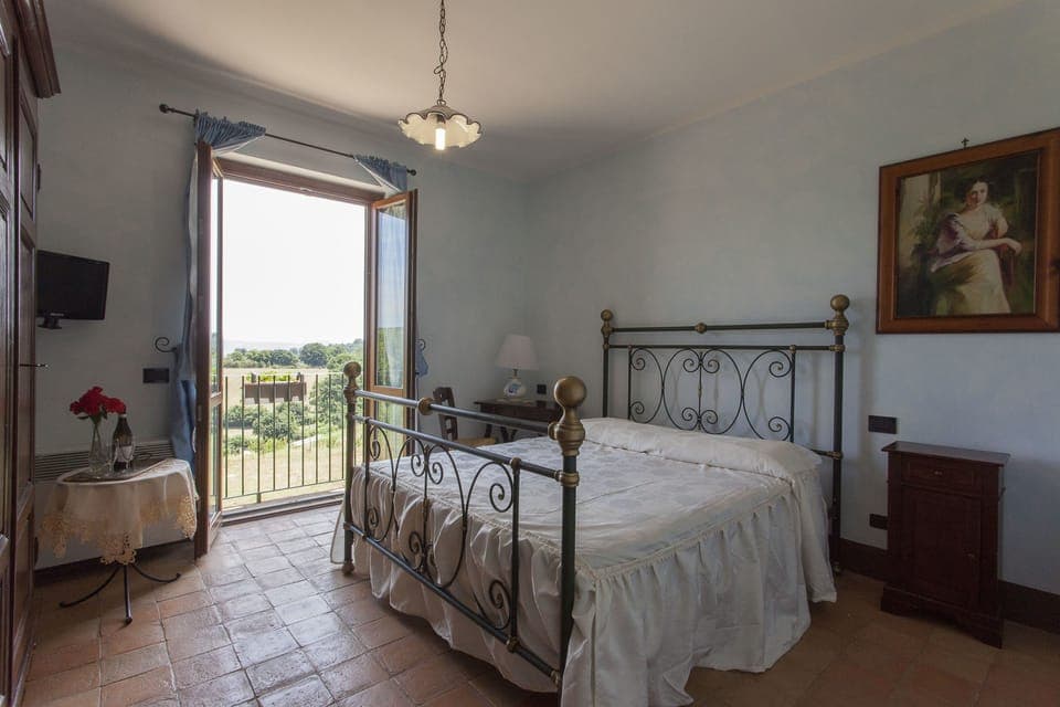 Double Room, Lake View | Iron/ironing board, cribs/infant beds, rollaway beds, free WiFi