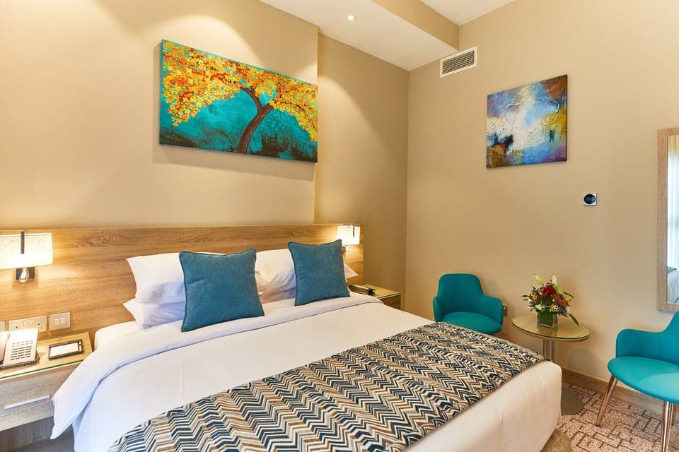 Classic King Room | Premium bedding, down comforters, in-room safe, individually decorated