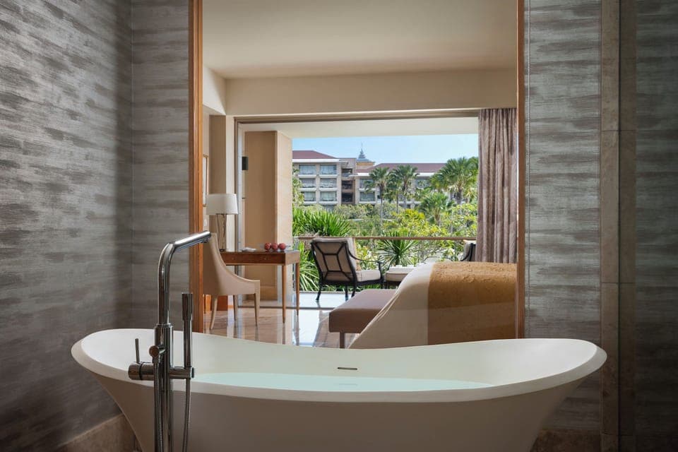 Signature Room (Mulia Signature) | Bathroom | Separate tub and shower, deep soaking tub, rainfall showerhead