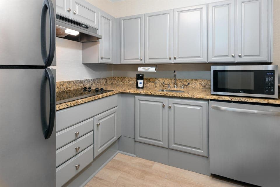 Suite, 1 King Bed, Accessible Roll In Shower, Non Smoking | Private kitchen | Fridge, microwave, coffee/tea maker