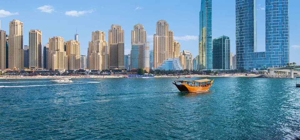 On the beach, white sand, sun loungers, beach umbrellas