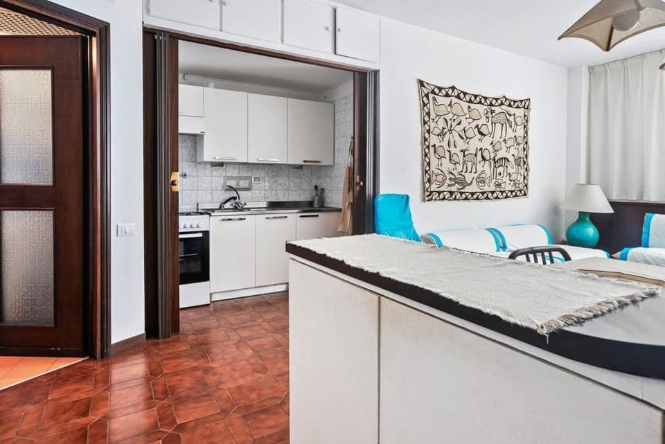 Apartment, 1 Bedroom | Living room | Flat-screen TV