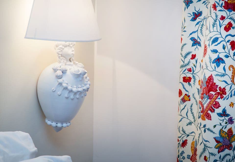 Family Room | Minibar, in-room safe, individually decorated, desk