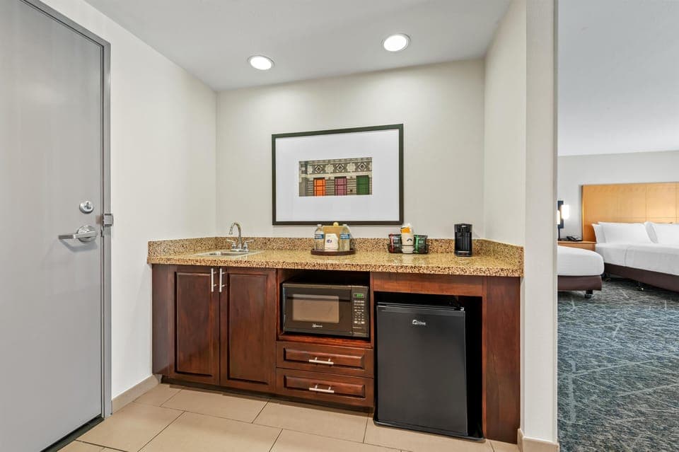 Suite, 2 Queen Beds, Non Smoking | Private kitchen | Fridge, microwave