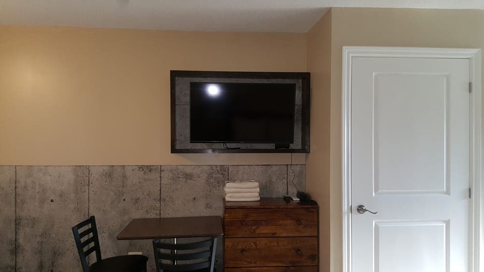 Room, 2 Queen Beds, Kitchenette | Blackout drapes, iron/ironing board, free WiFi, bed sheets