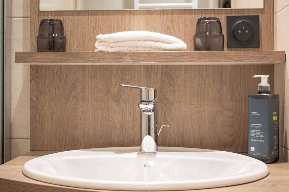 Premium bedding, desk, blackout drapes, soundproofing