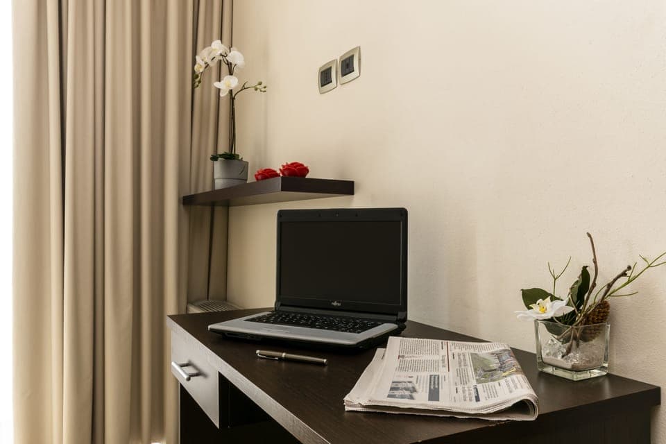 Superior Apartment | Premium bedding, down comforters, desk, blackout drapes