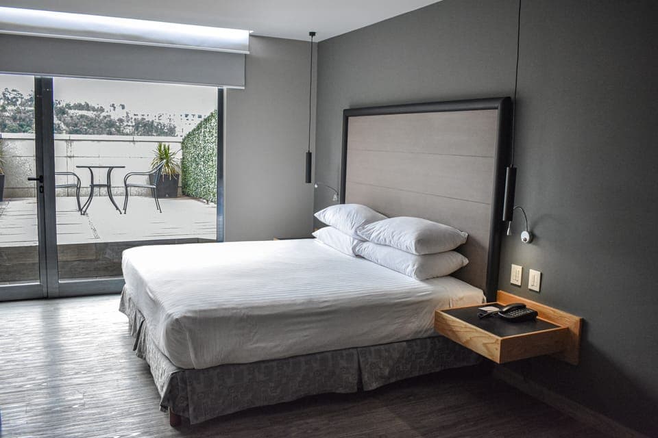 Suite, 1 King Bed, Non Smoking, Terrace | Down comforters, memory foam beds, in-room safe, individually furnished