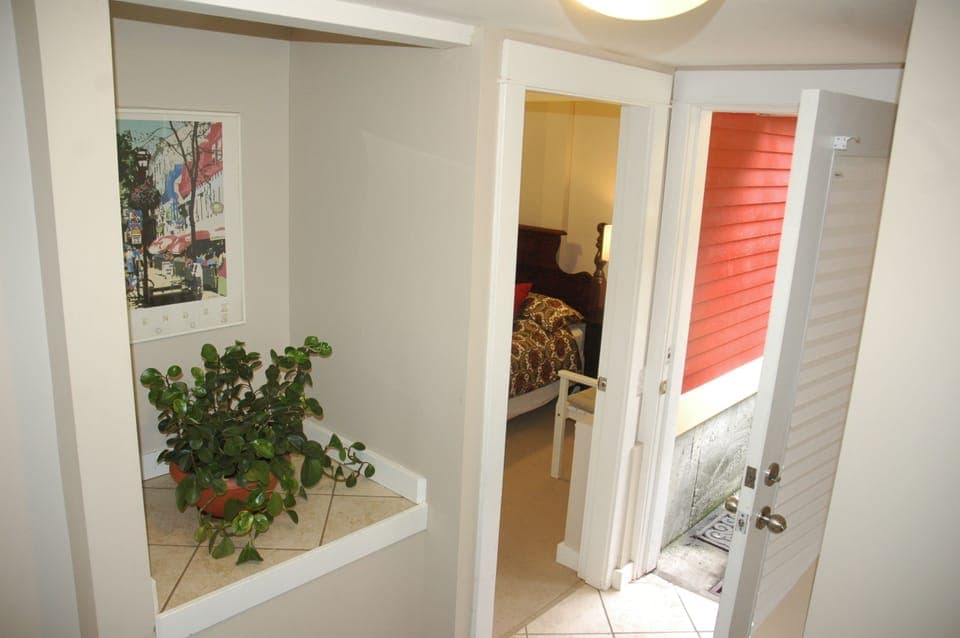 Comfort Room, 1 Bedroom, Private Bathroom (Lower Level) | Iron/ironing board, free WiFi, bed sheets