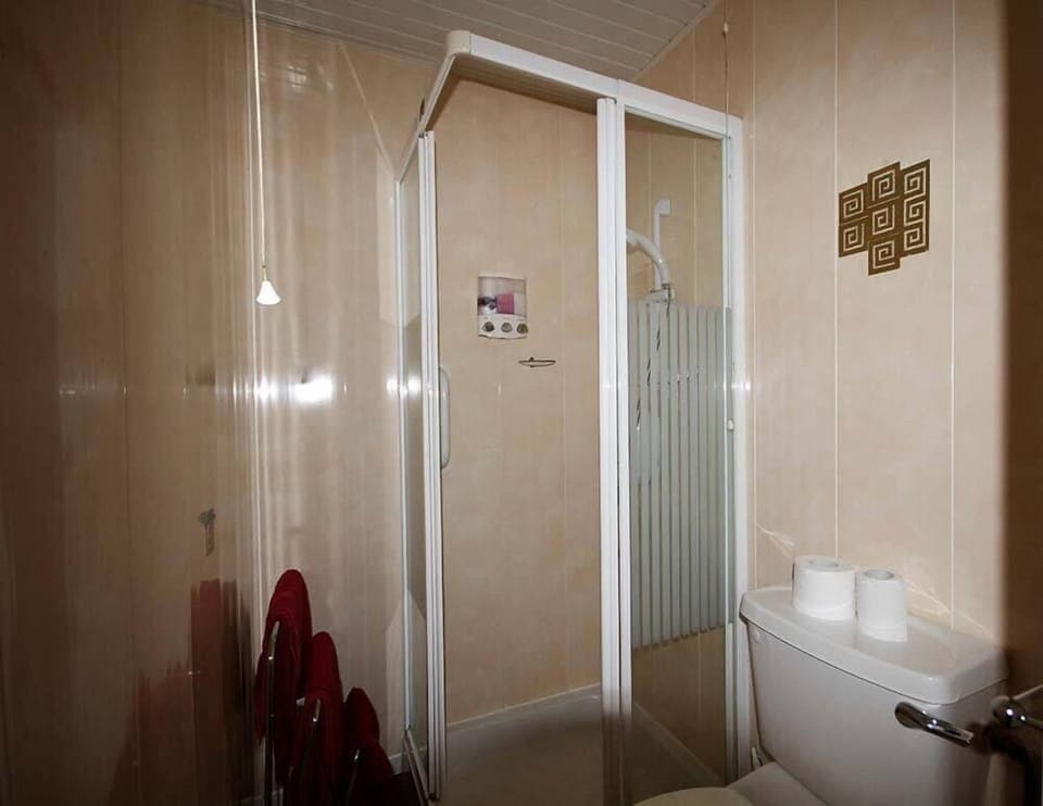 Shower, free toiletries, hair dryer, bathrobes