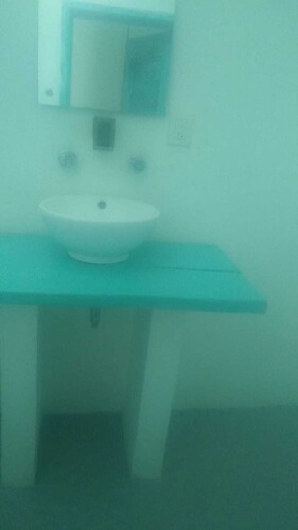 Economy Room | Bathroom sink