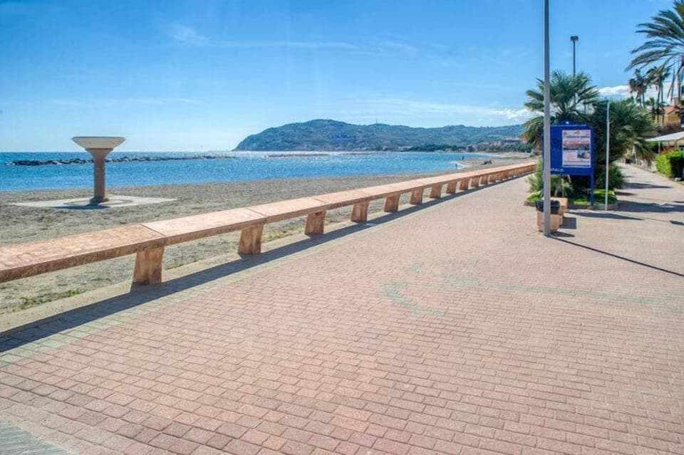 On the beach, black sand