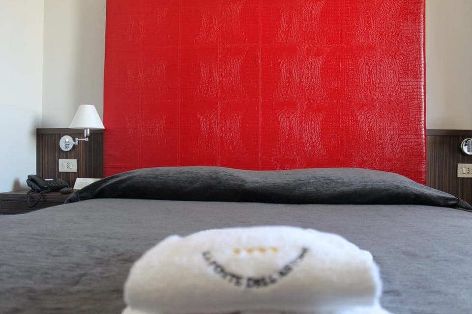 Minibar, desk, blackout drapes, iron/ironing board