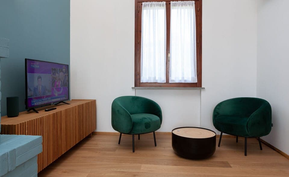 Superior Suite, 1 Bedroom, Fireplace, Garden Area | 1 bedroom, down comforters, desk, laptop workspace