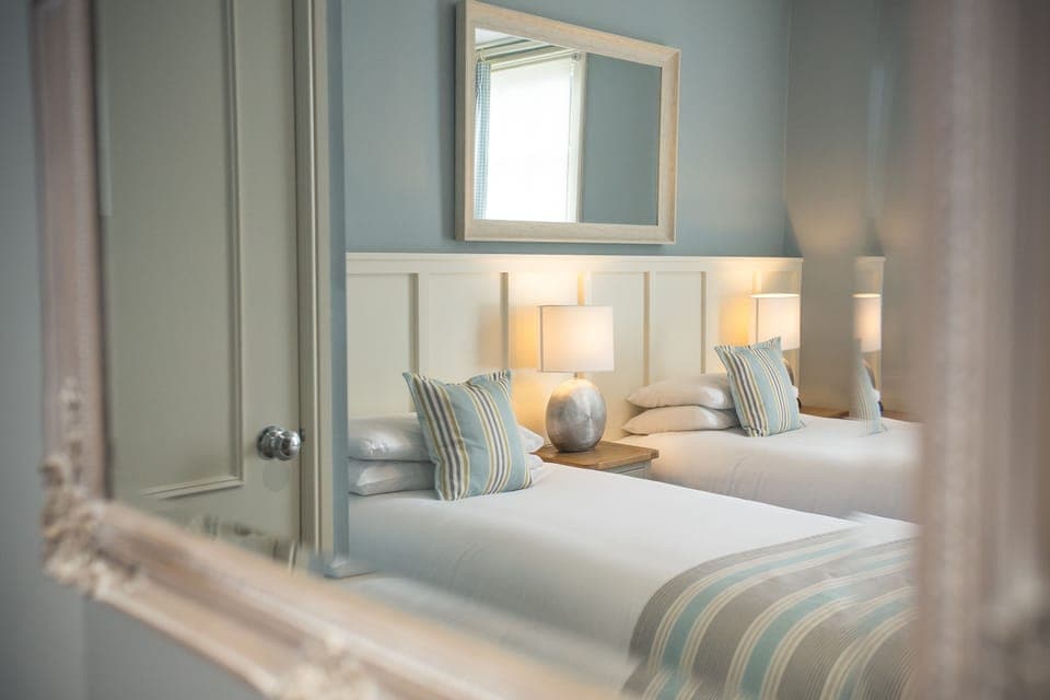 Desk, iron/ironing board, cribs/infant beds, rollaway beds