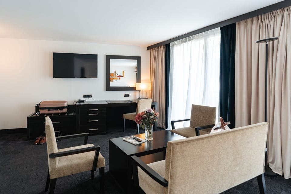 Privilege Suite with balcony | Premium bedding, desk, blackout drapes, soundproofing
