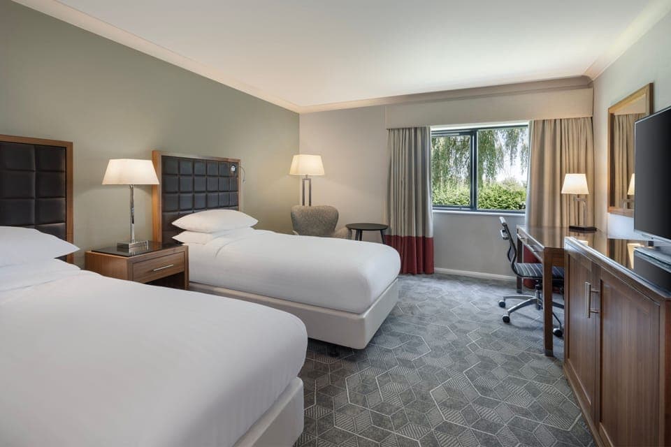 Deluxe Room, 2 Twin Beds | Premium bedding, down comforters, Select Comfort beds, in-room safe