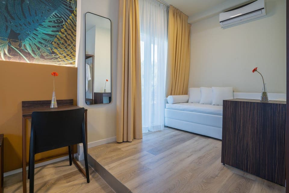 Quadruple Room, Balcony | In-room safe, desk, blackout drapes, free WiFi