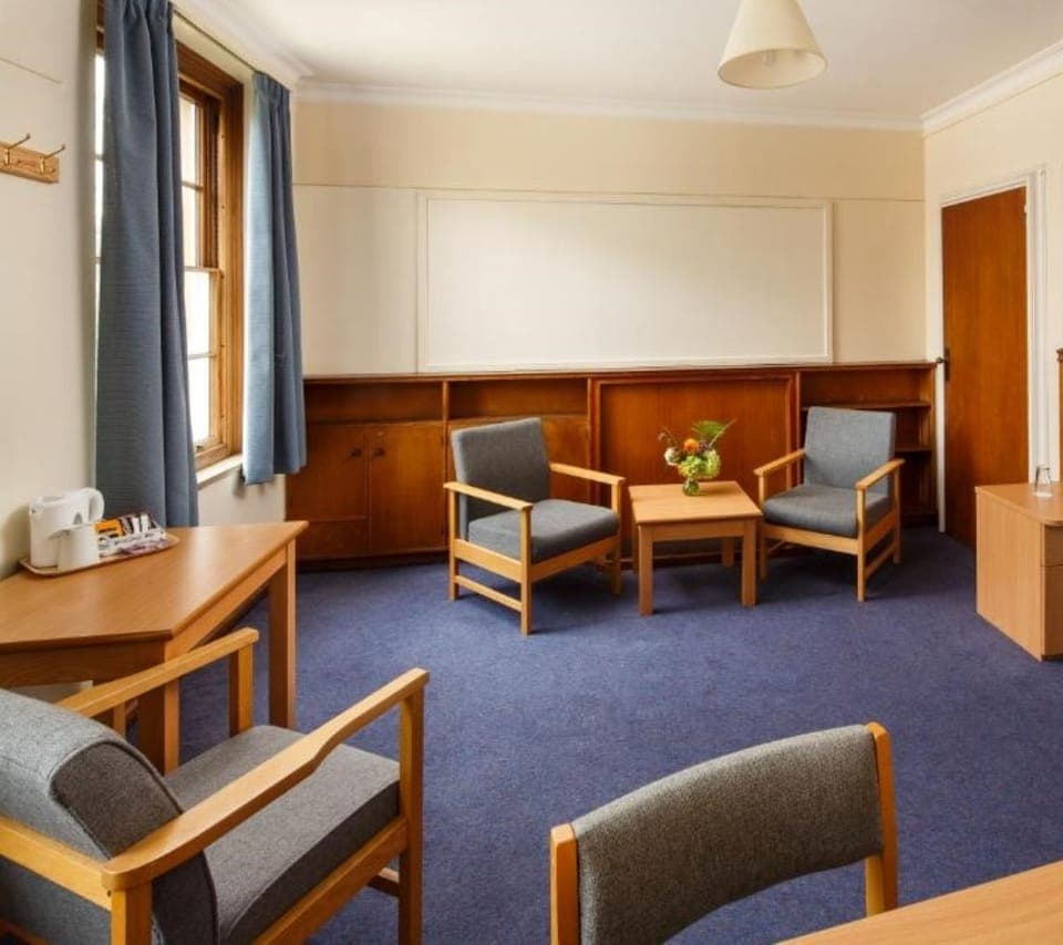 Desk, laptop workspace, free WiFi, bed sheets