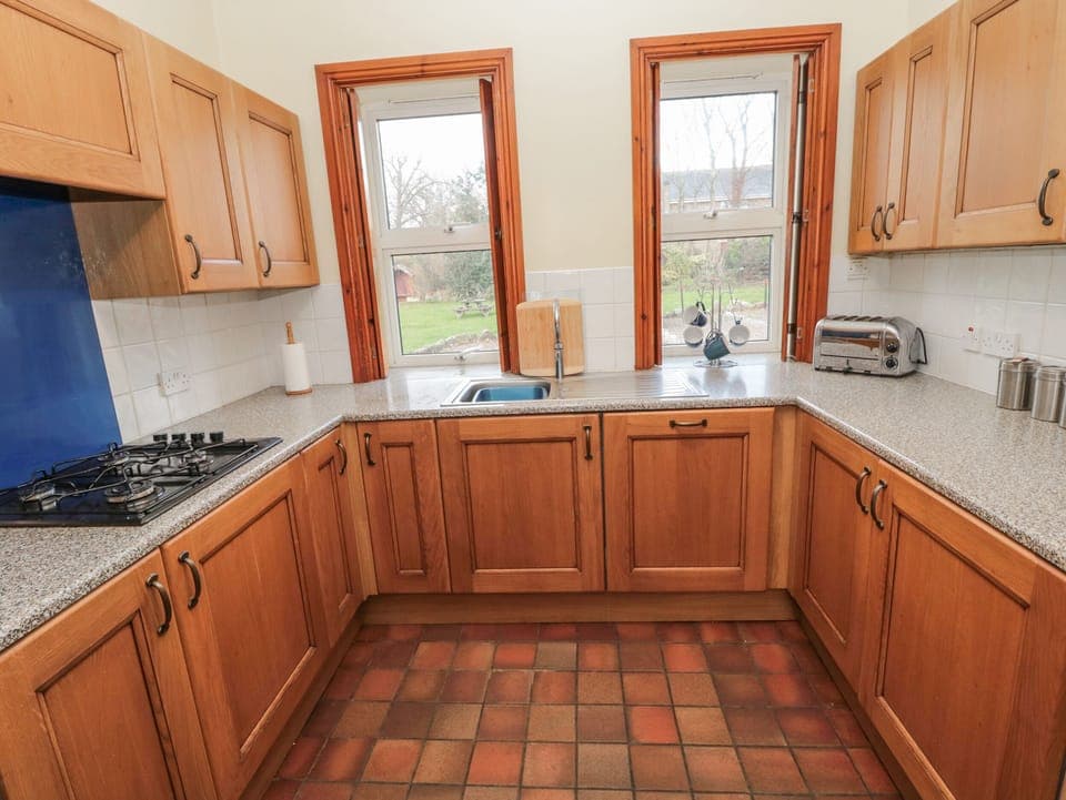 Cottage | Private kitchen | Fridge, dishwasher, electric kettle, toaster
