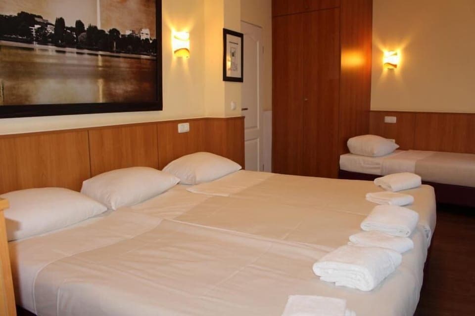 Desk, iron/ironing board, free WiFi, bed sheets