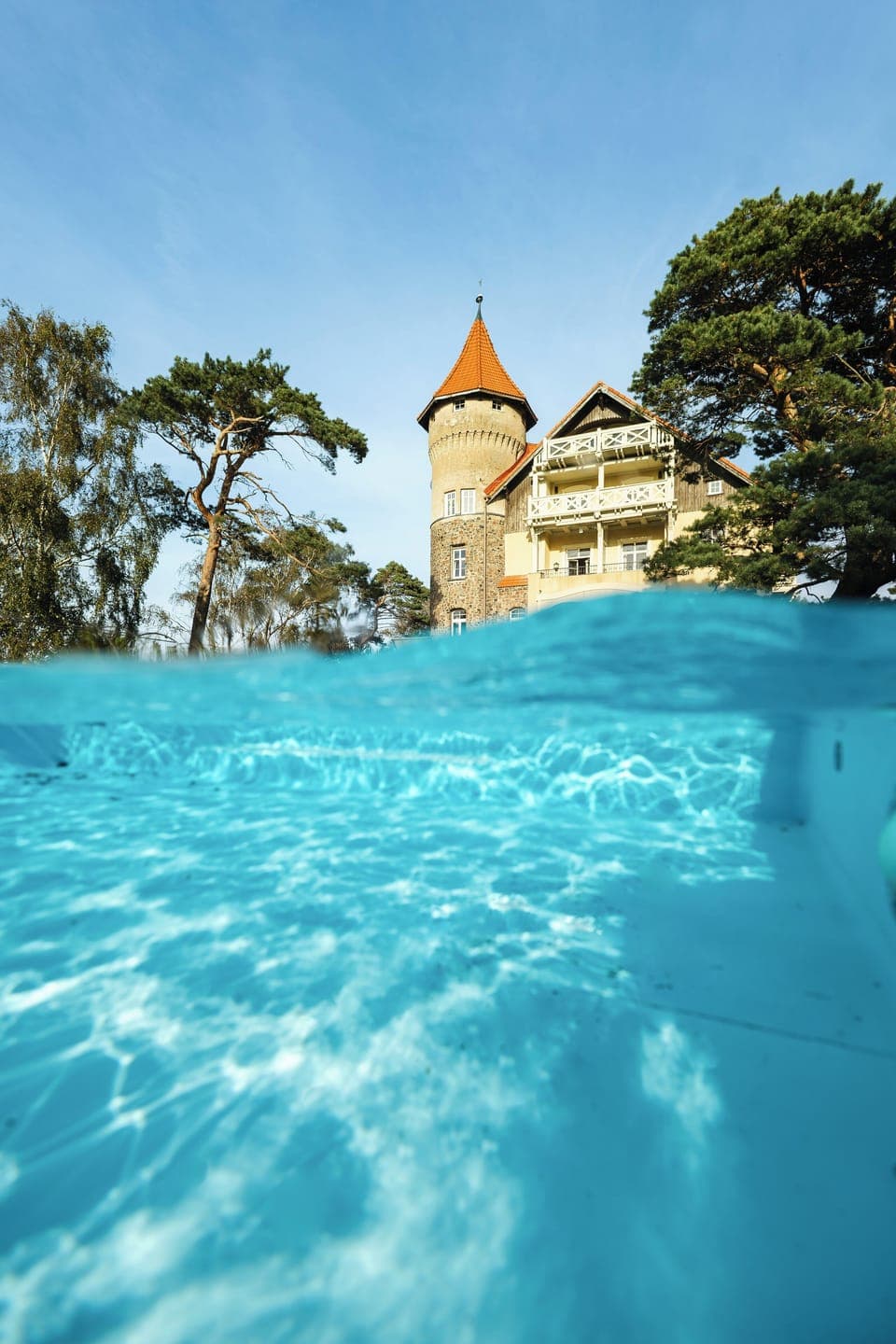 Seasonal outdoor pool, open 10:00 AM to 9:00 PM, pool umbrellas