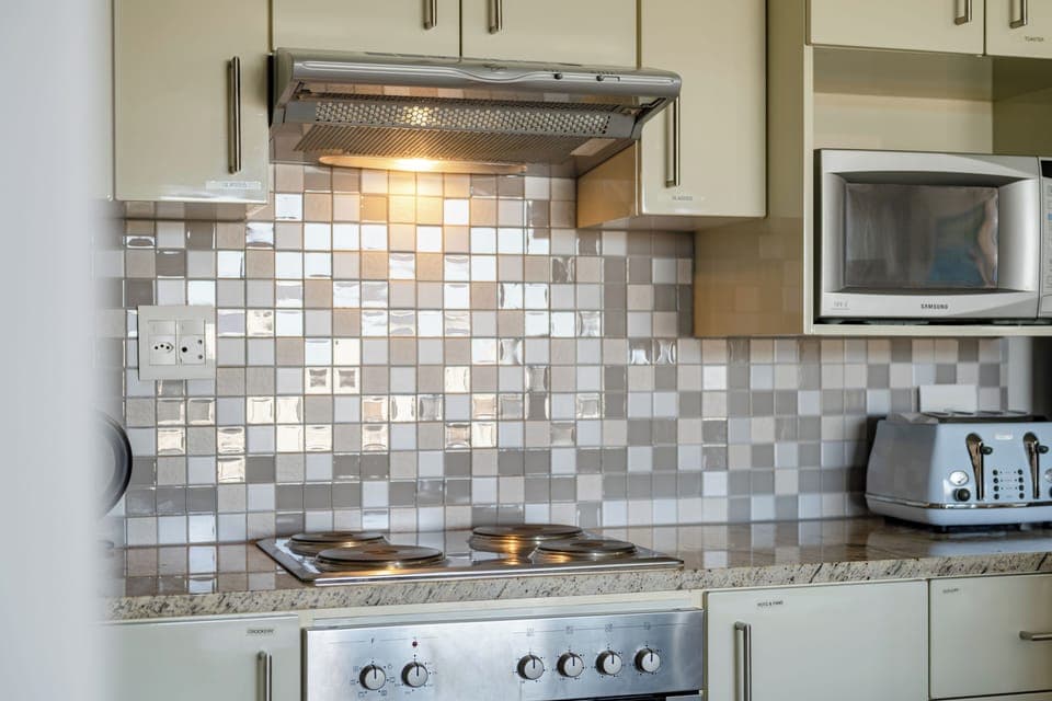 Village Residence | Private kitchen | Fridge, electric kettle