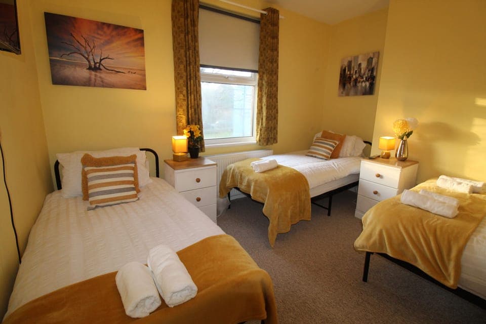 Laptop workspace, free WiFi, bed sheets