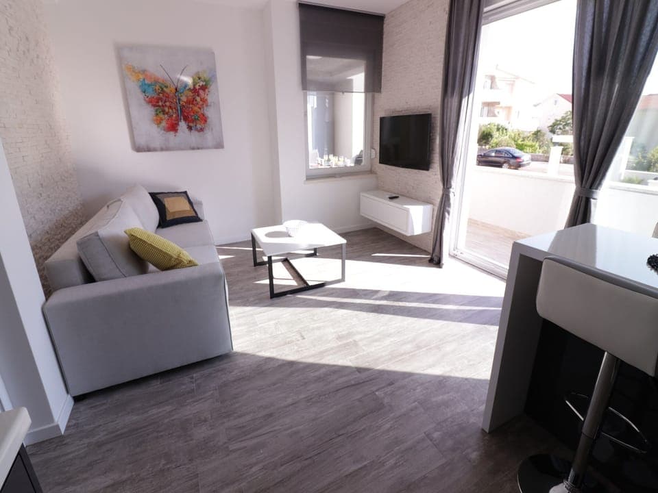 Comfort Apartment, 2 Bedrooms, Terrace | Living area | 45-inch flat-screen TV with satellite channels, TV