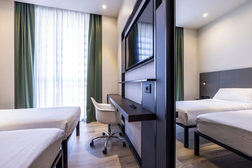 Standard Room, 2 Twin Beds | Minibar, in-room safe, desk, soundproofing