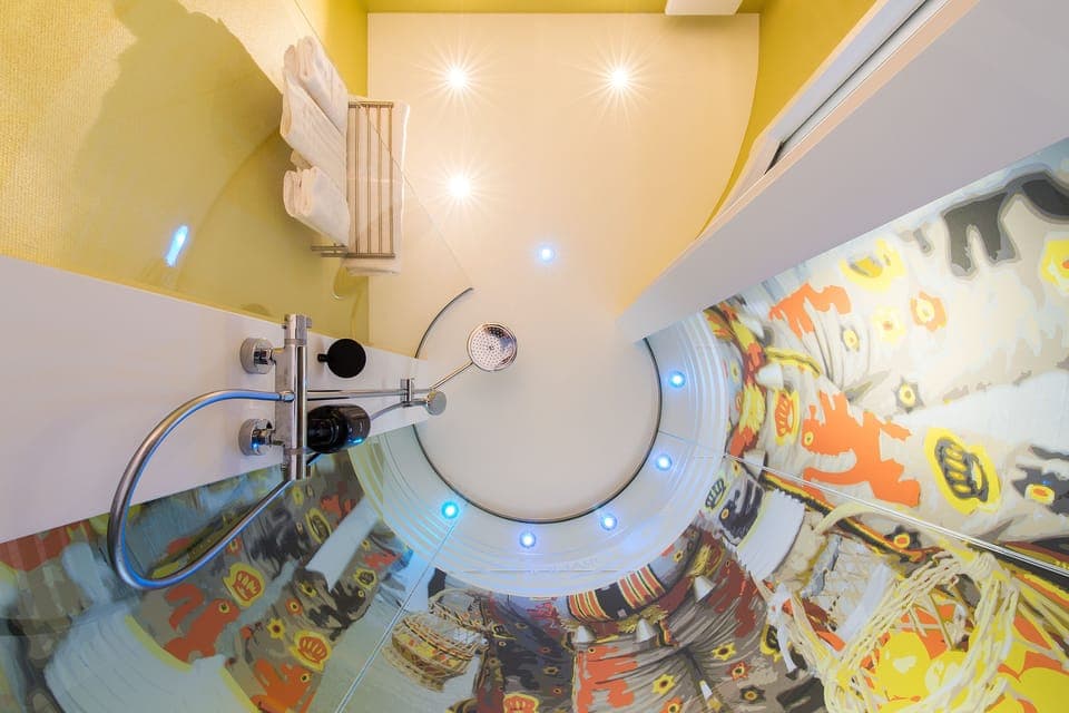 Cocoon Room | Bathroom | Rainfall showerhead, free toiletries, hair dryer, towels