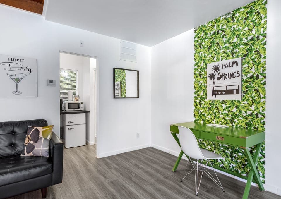 Standard Suite, 1 King Bed | Living area | TV