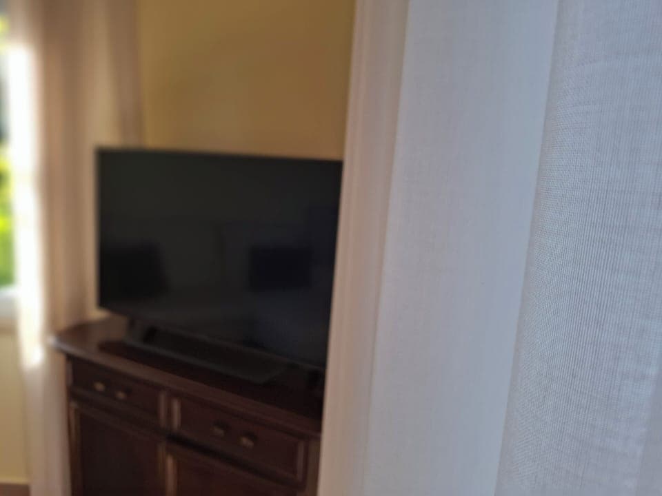 Family Apartment, 2 Bedrooms (B) | Living room | 32-inch flat-screen TV with satellite channels, TV