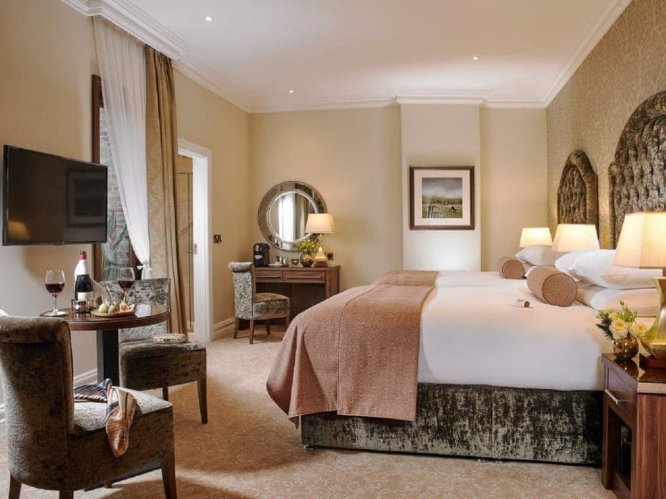 Egyptian cotton sheets, down comforters, pillowtop beds, in-room safe