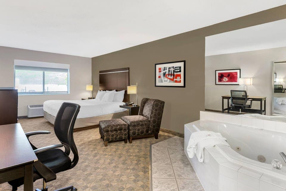 Room, 1 King Bed, Non Smoking | Pillowtop beds, desk, laptop workspace, blackout drapes