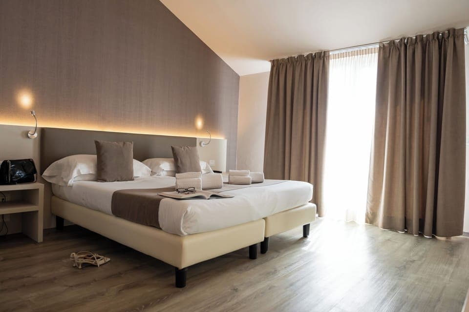 Romantic Suite, Hot Tub | Minibar, in-room safe, individually furnished, desk