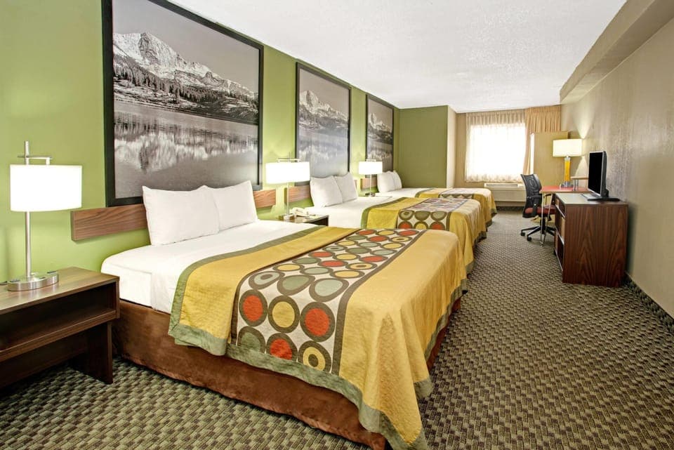 Room, Multiple Beds, Non Smoking | Desk, blackout drapes, iron/ironing board, free cribs/infant beds