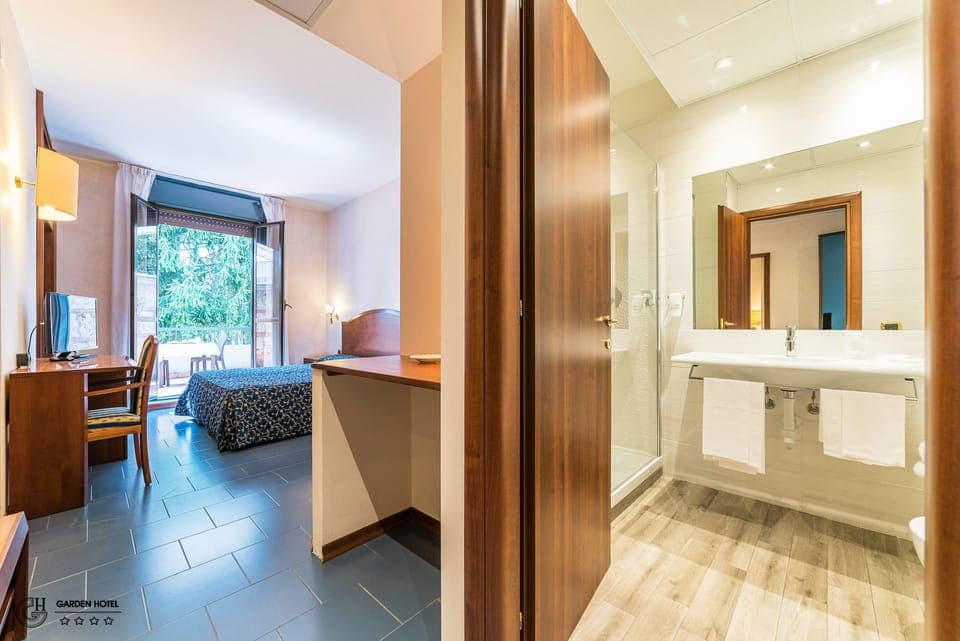 Single Room | Down comforters, minibar, in-room safe, desk