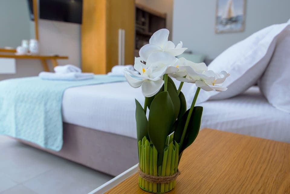 Family Quadruple Room | Desk, laptop workspace, free WiFi, bed sheets