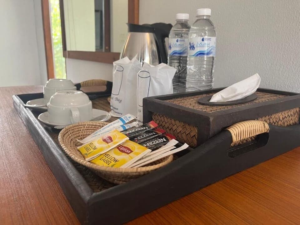 Superior Cottage, 1 Queen Bed, Garden View | Free minibar items, in-room safe, desk, laptop workspace