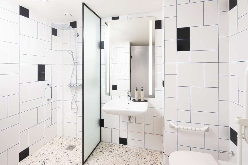 Room, 1 King Bed, Accessible | Bathroom | Shower, rainfall showerhead, free toiletries, hair dryer