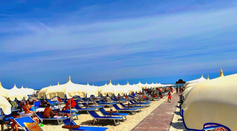 Beach cabanas, sun loungers, beach umbrellas