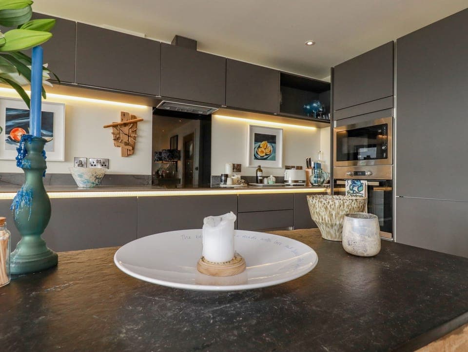 Fridge, electric kettle, toaster, cookware/dishes/utensils