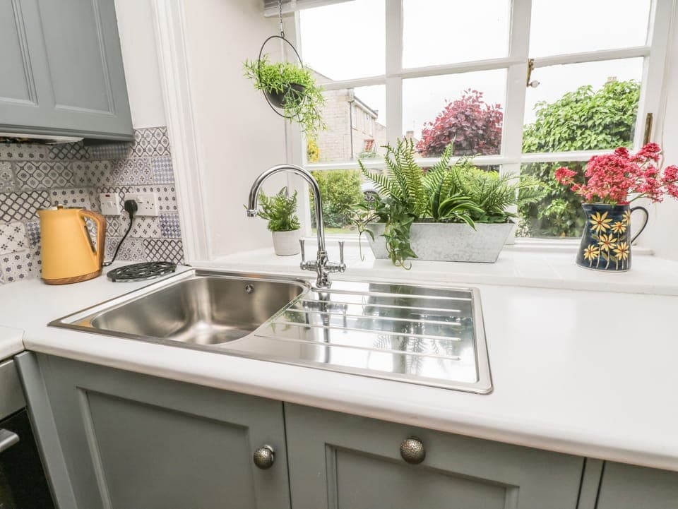 Fridge, dishwasher, electric kettle, cookware/dishes/utensils