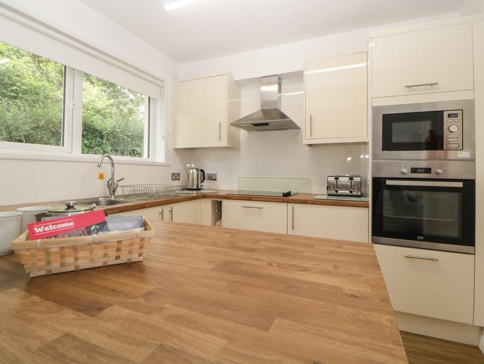 Fridge, electric kettle, toaster, cookware/dishes/utensils