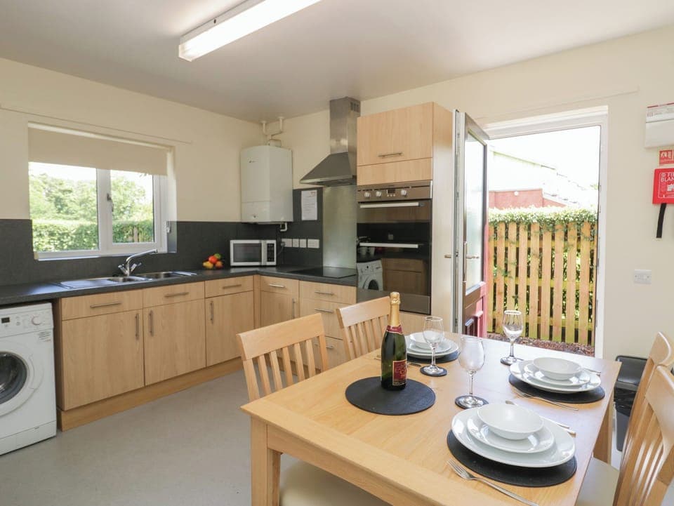 Fridge, electric kettle, toaster, cookware/dishes/utensils